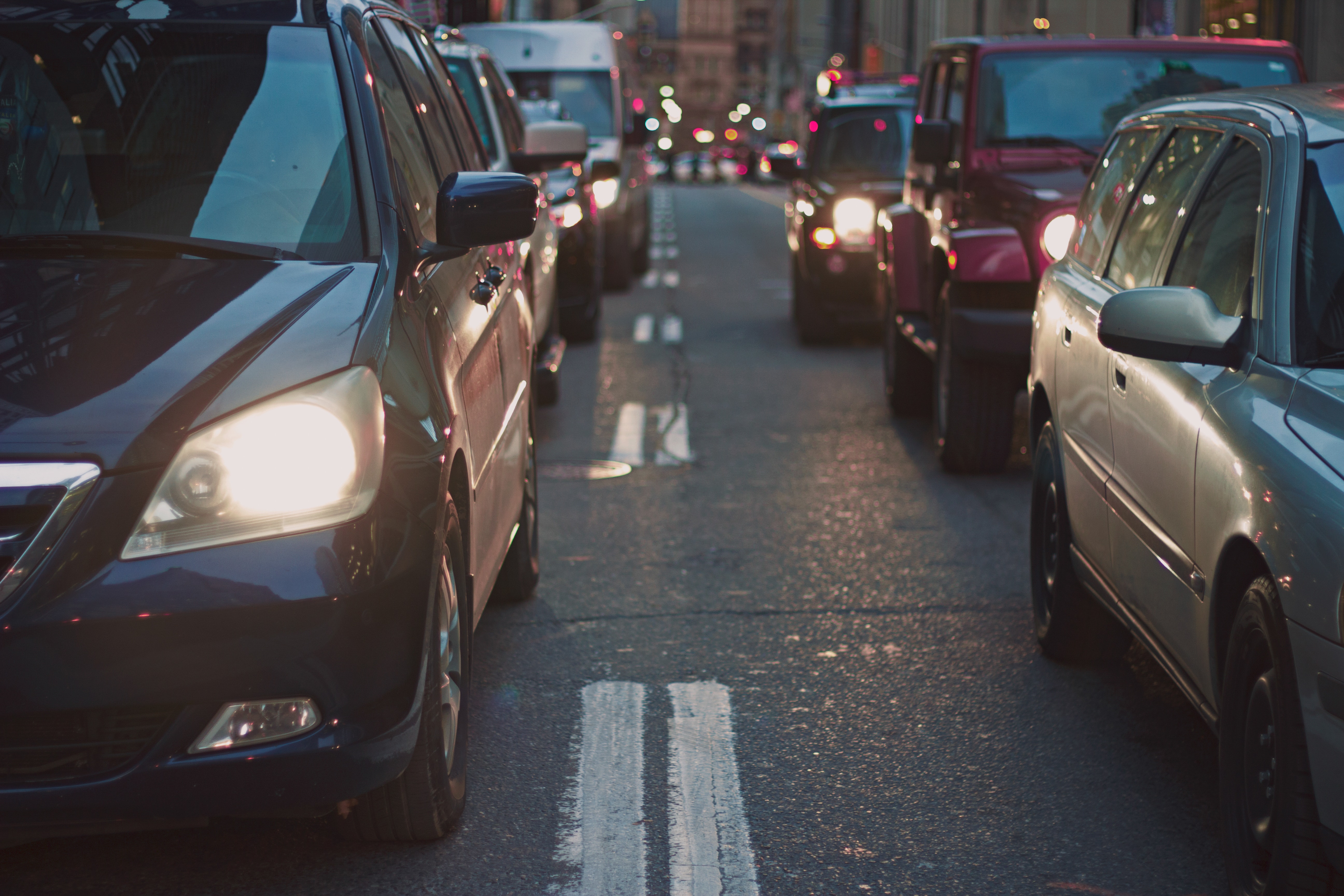 Cars Parked At Traffic Light